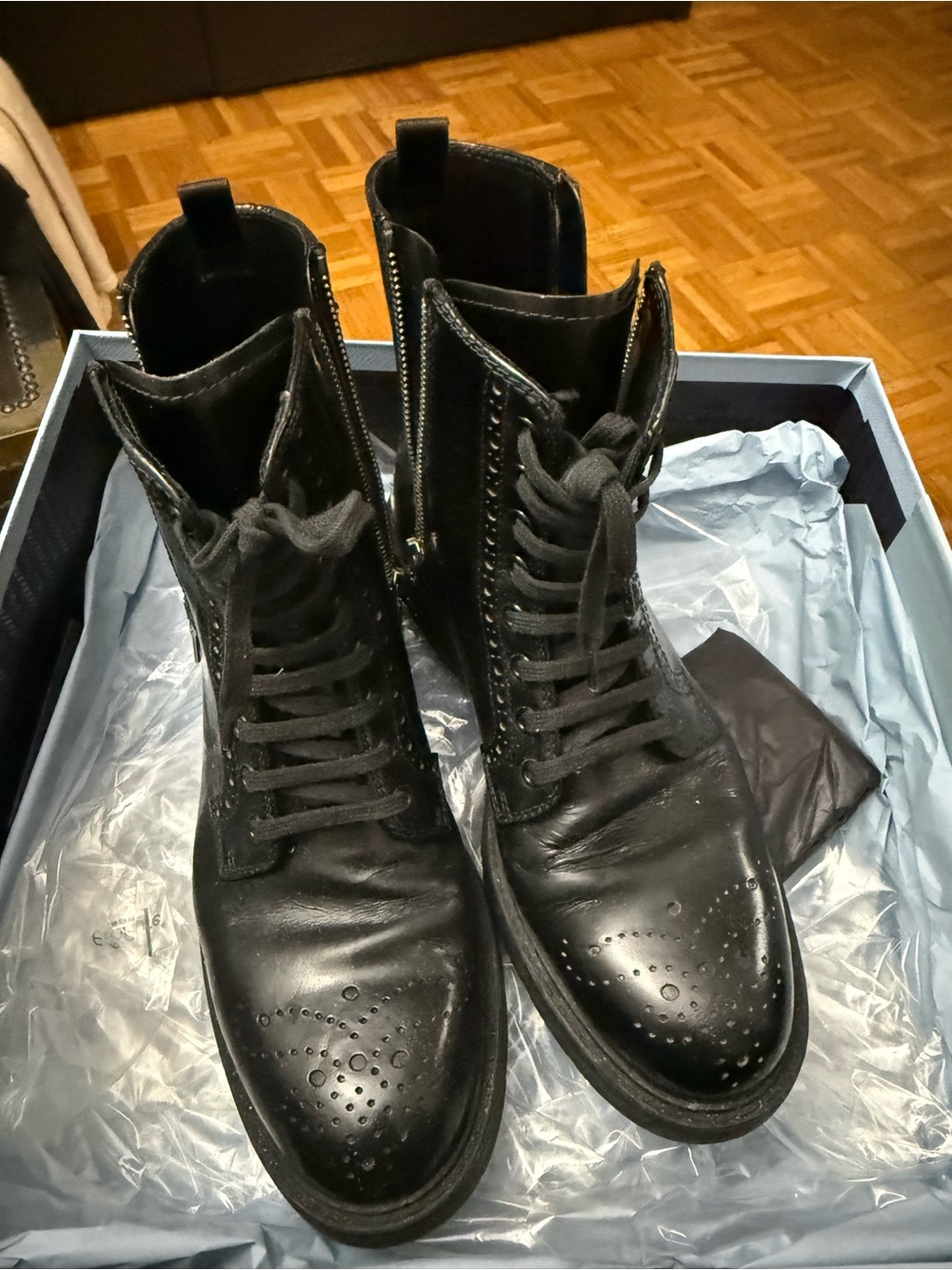 PRADA women’s Black Leather Chukka Boots with Wingtip Perforation